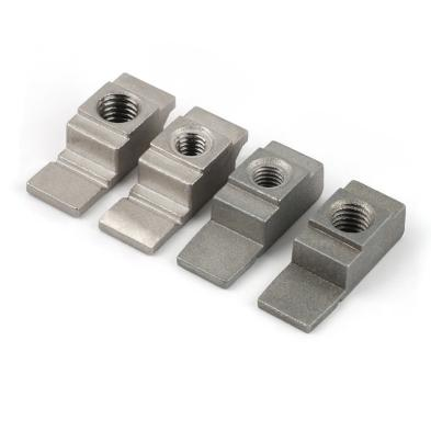 Welke kleine kastaccessoires houden een industriële behuizing eigenlijk bij elkaar?
